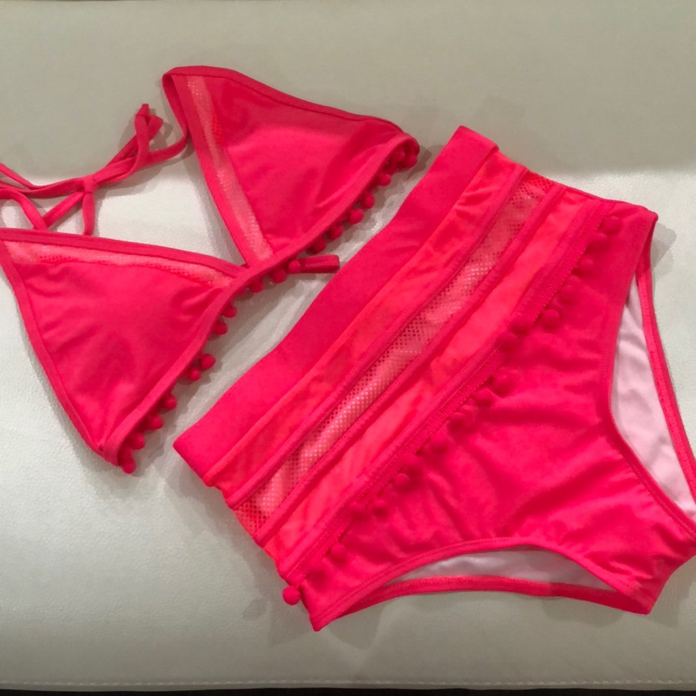 Two piece bathing suit in bright pink